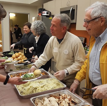 Serving Thanksgiving dinner to Contra Costa Interfaith Housing reesidents (cropped)